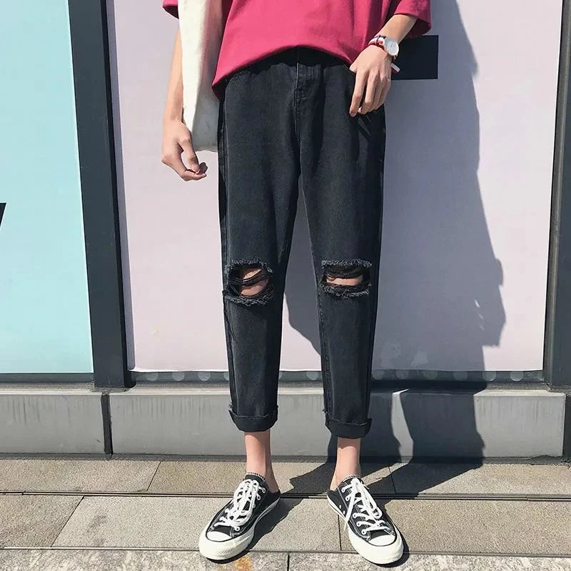 BLACK RIPPED JEANS