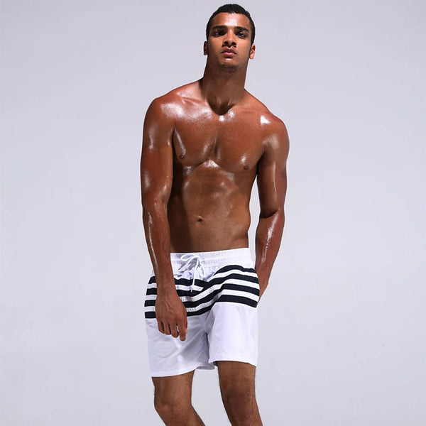 STRIPED SWIMMING TRUNKS